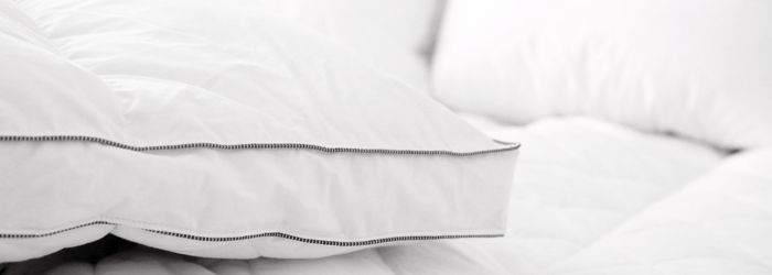¿Por qué incluir un cubre colchón en tu cama?